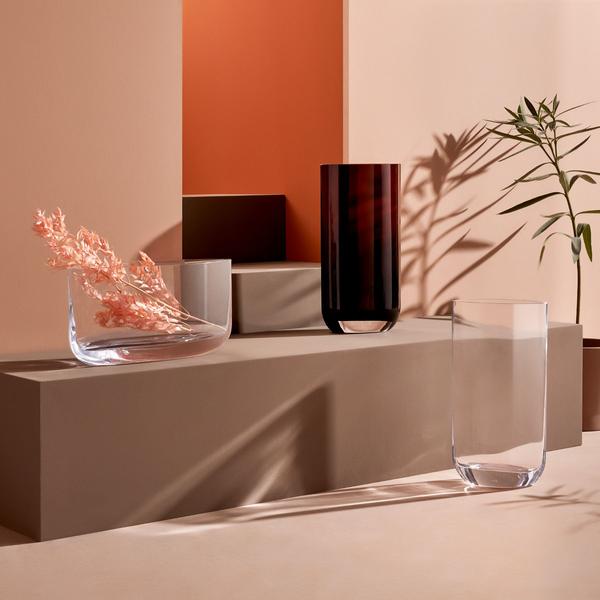 Pastel colorway static display of two tall vases and a wide vase with fall flowers.