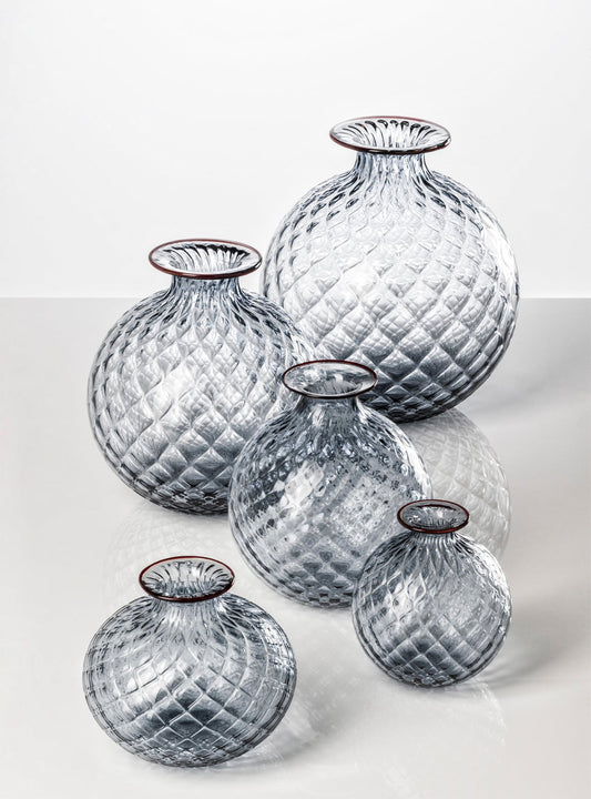 Monofiori vase collection in purple, shown in all its available sizes.