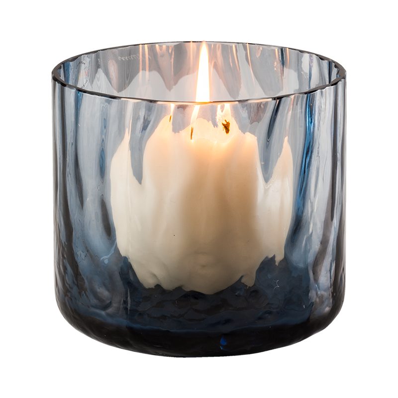 Glass tea light candle holder in etched Murano glass.