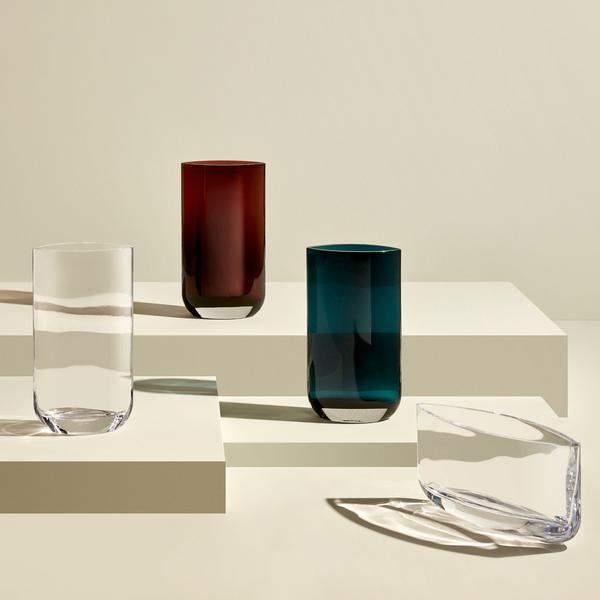 Static display of three color ways available for the tall modern glass vase.