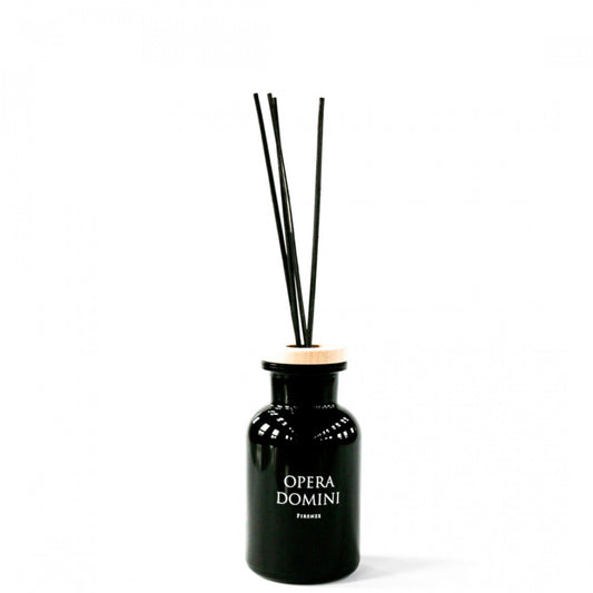 Chic and modern room diffuser with a black base, wood rim and black incense reeds. 