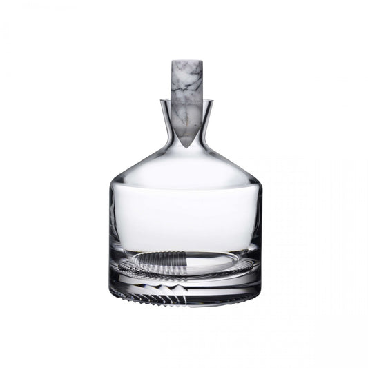 Wide bottom decanter with left-etched decorative facets and a removable marble stopper.