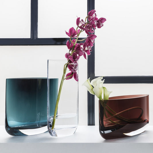 Blade vase in all 3 colors and sizes, layered together with floral accents.